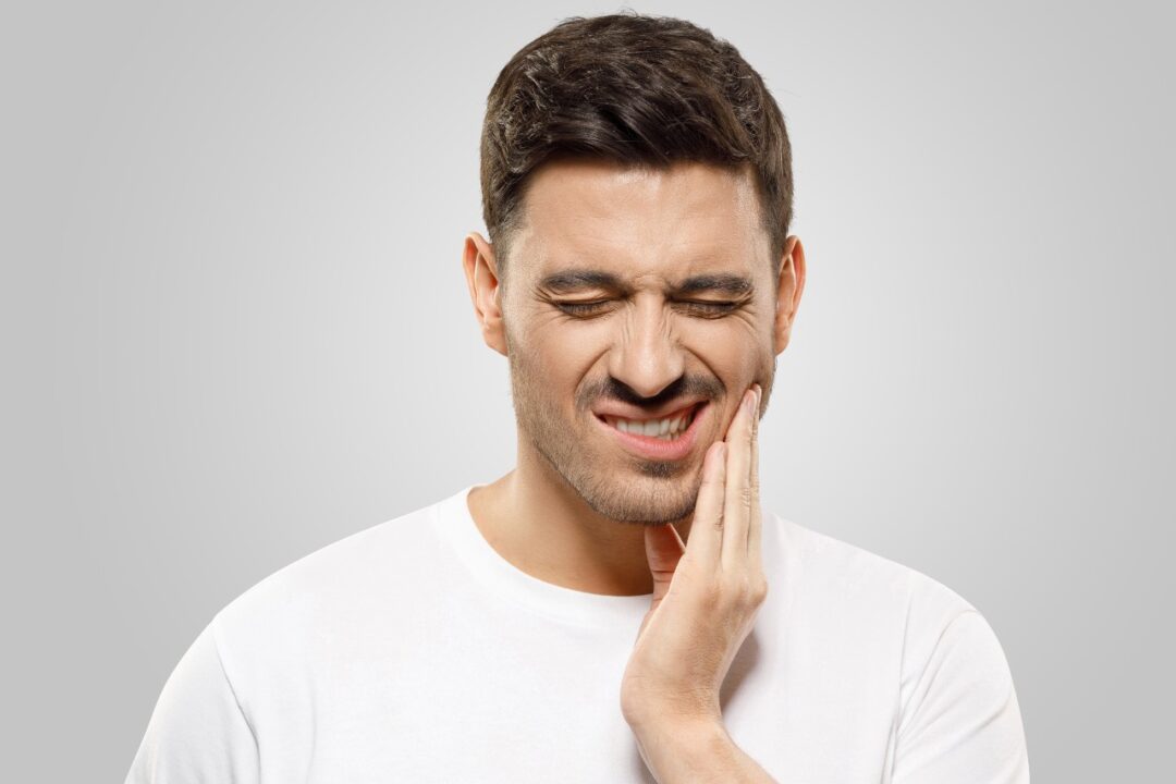 How do I alleviate tooth pain at home?